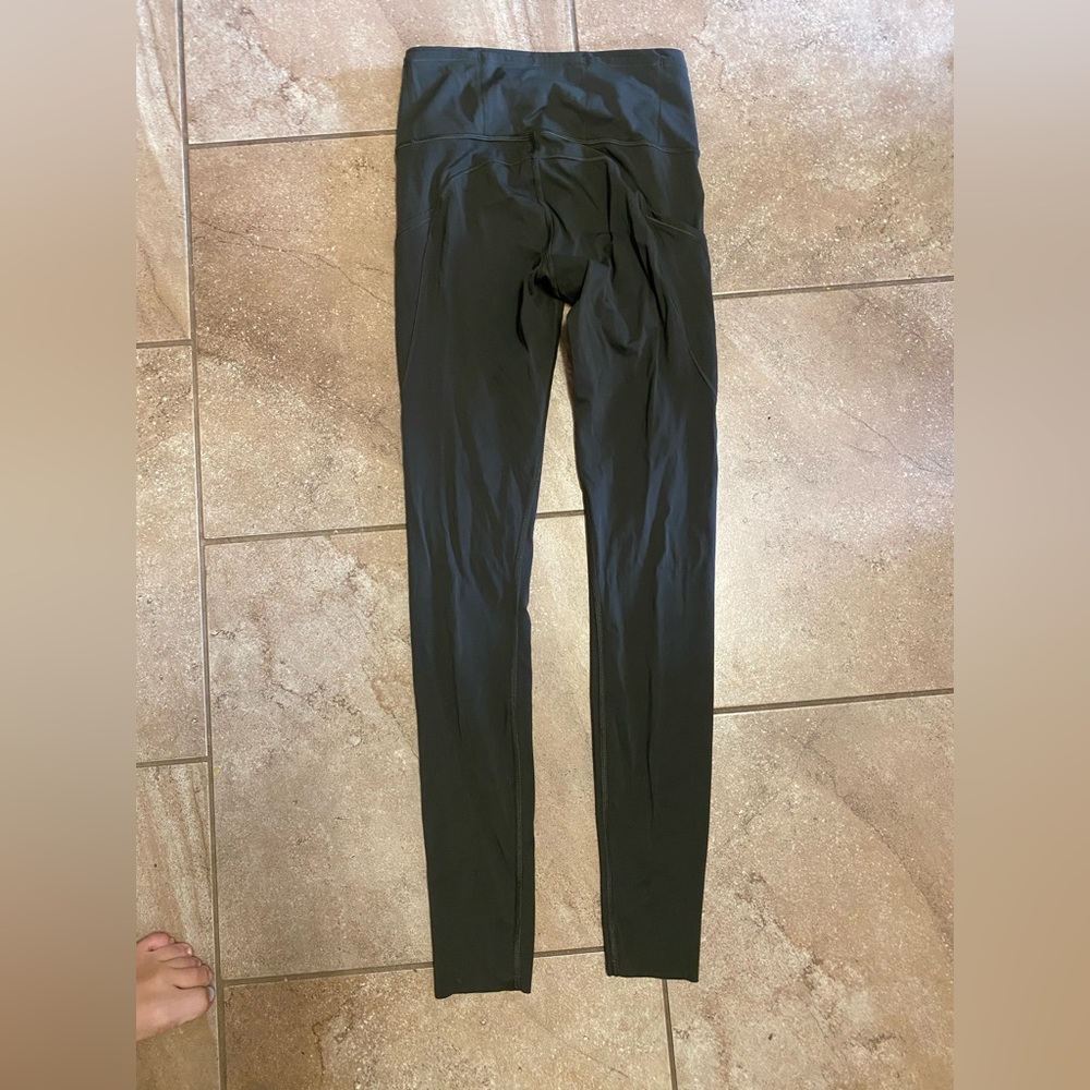 Green lulu leggings size 4 worn one time